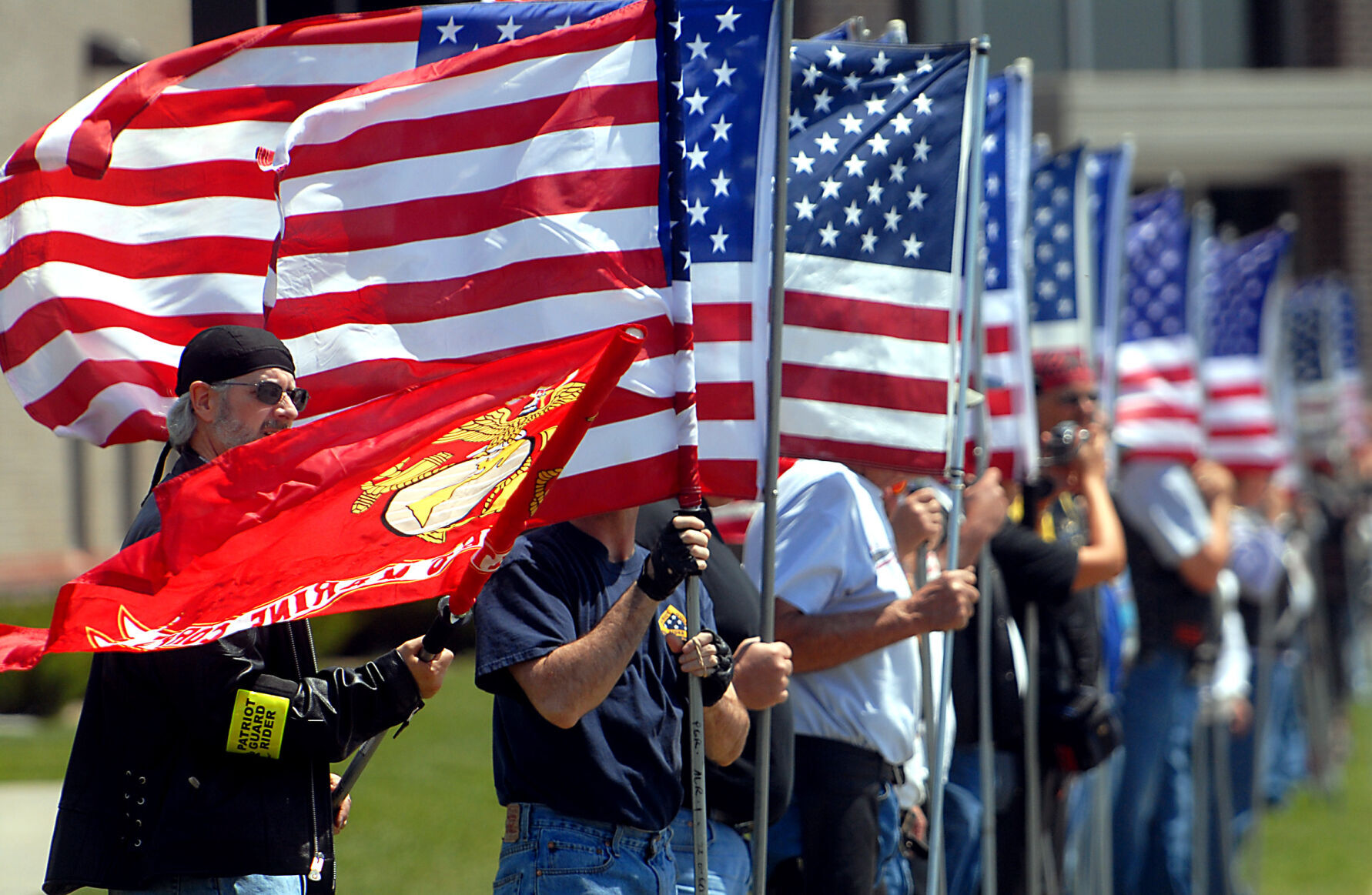 Marine Corps flag with American flags, 2007